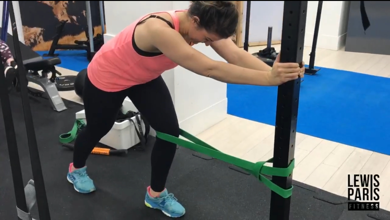 Laura training with a resistance band