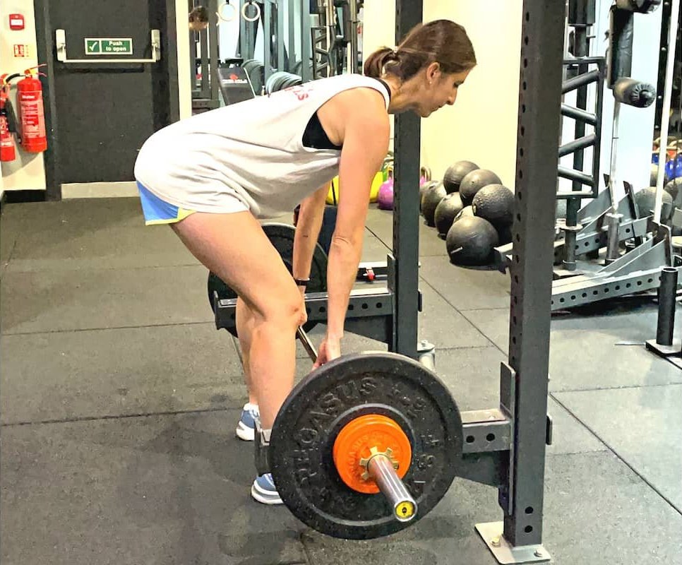 A personal trainer weight lifting in London