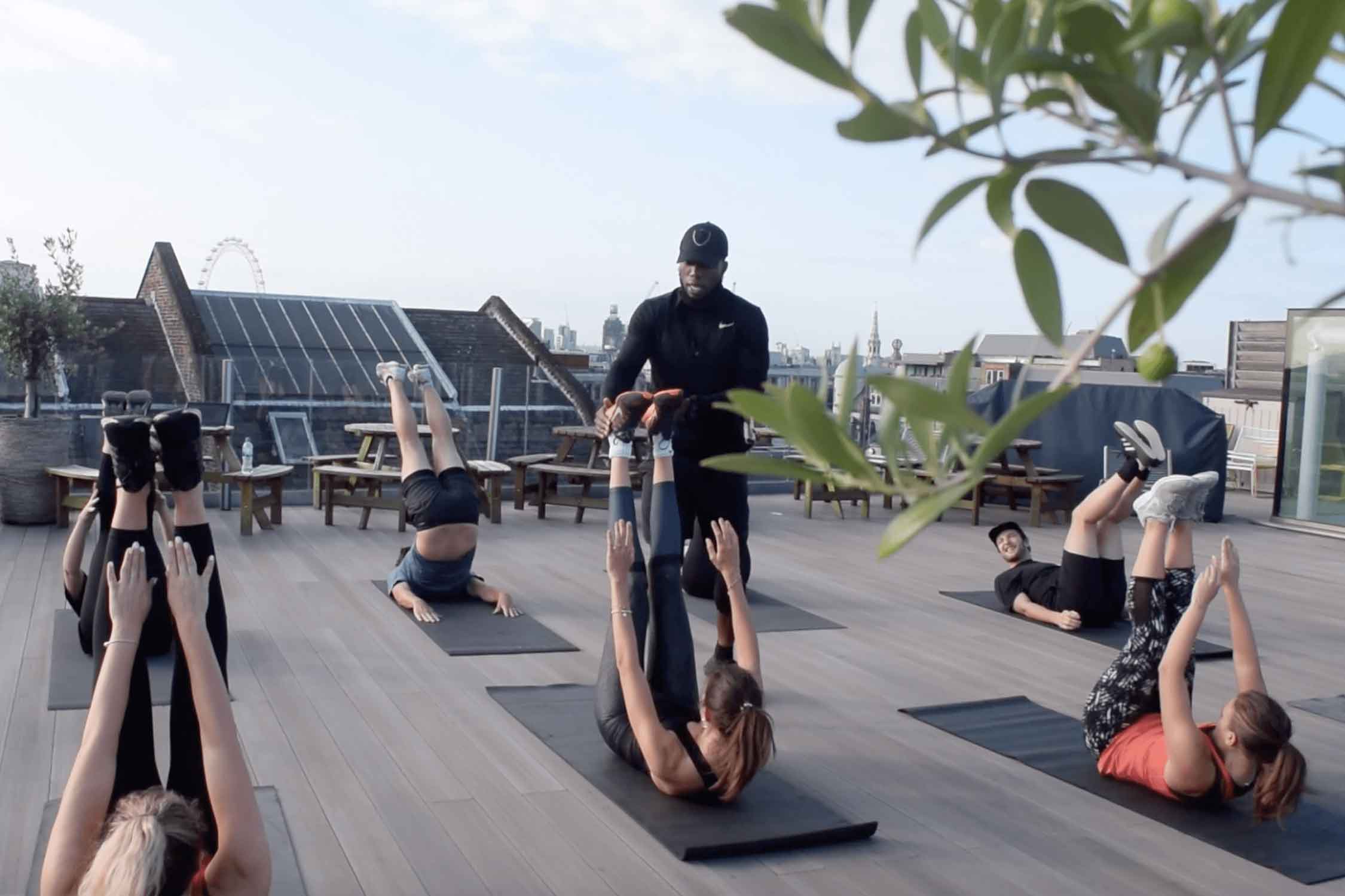 Lewis Paris hosting a group fitness class for the employees of Red Bull UK